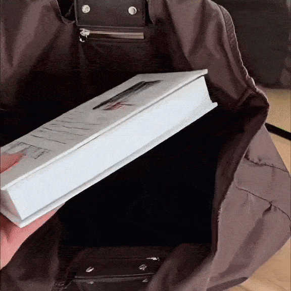 Loading an armful of things into the TinyTote in one go